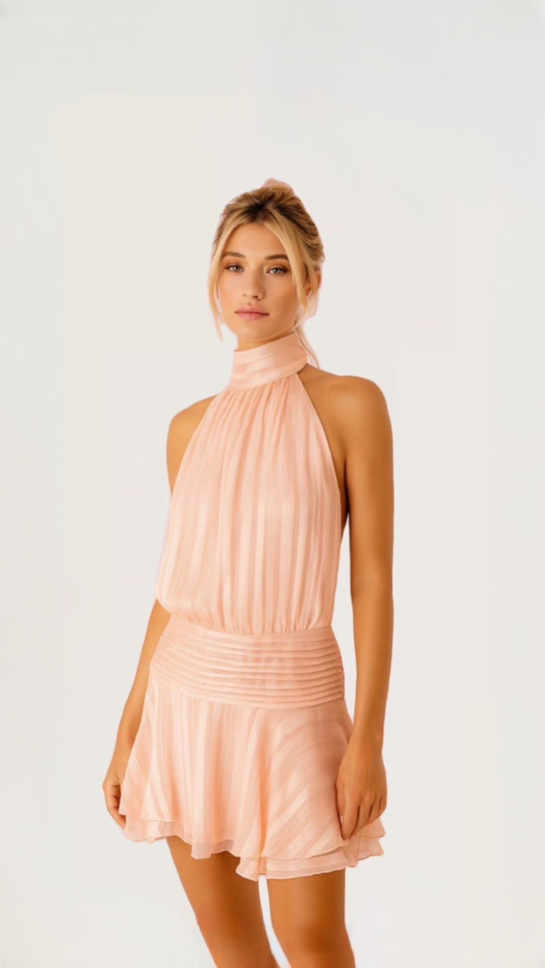 Open-back Halter mini with wavy hem